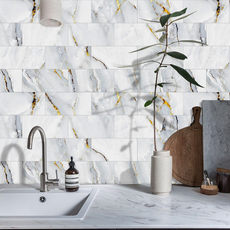 Marble peel and stick backsplash tiles in a kitchen